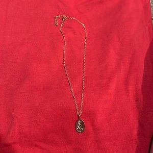 Gold flower pendant necklace